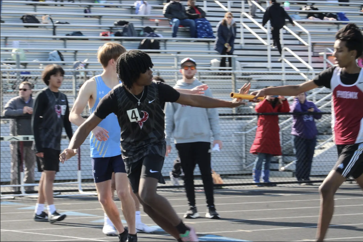 Senior Jamari Anthony runs the Boys 4x400 Meter Relay Finals.
